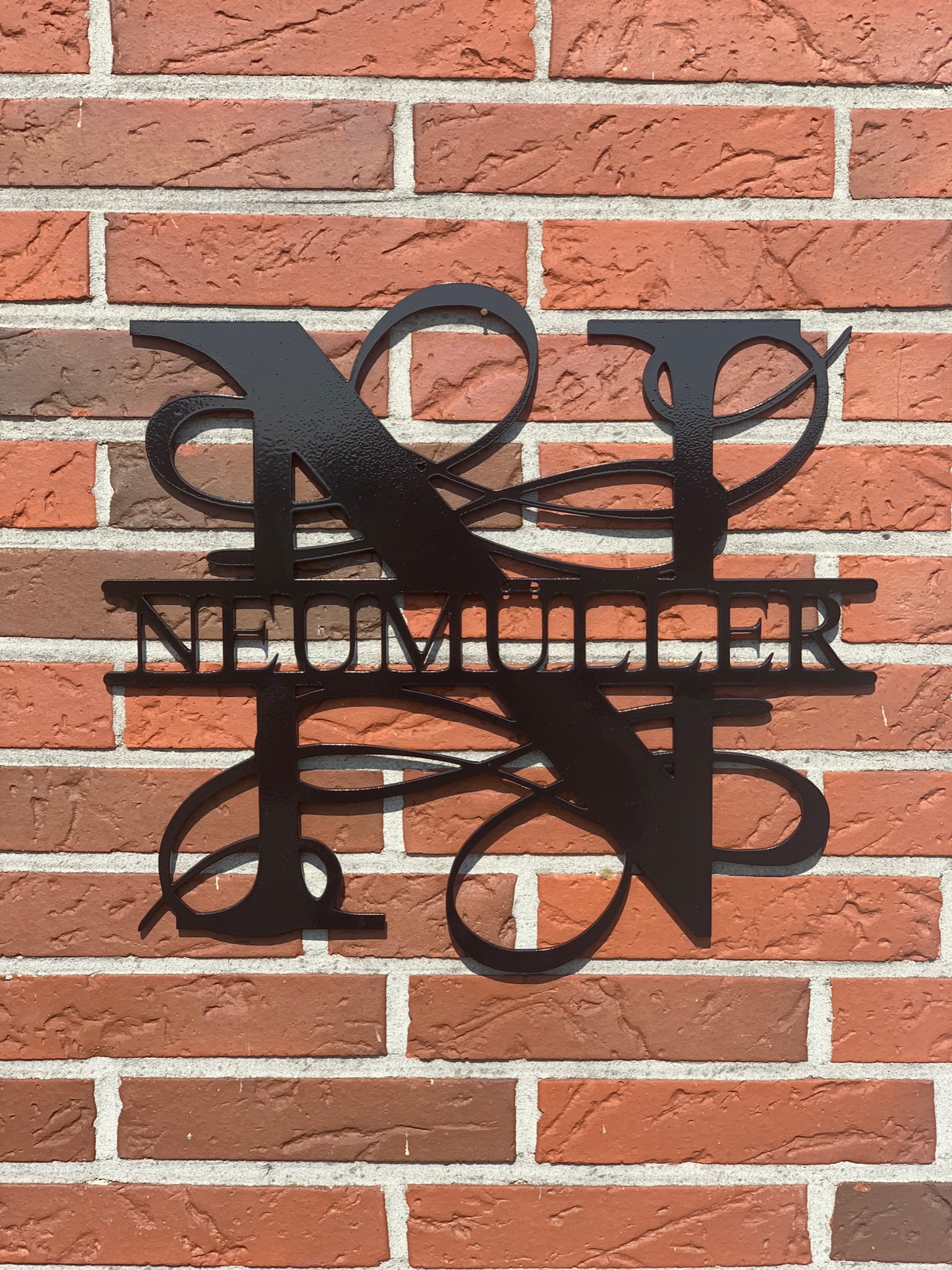 Monogramm Schriftzug Neumueller