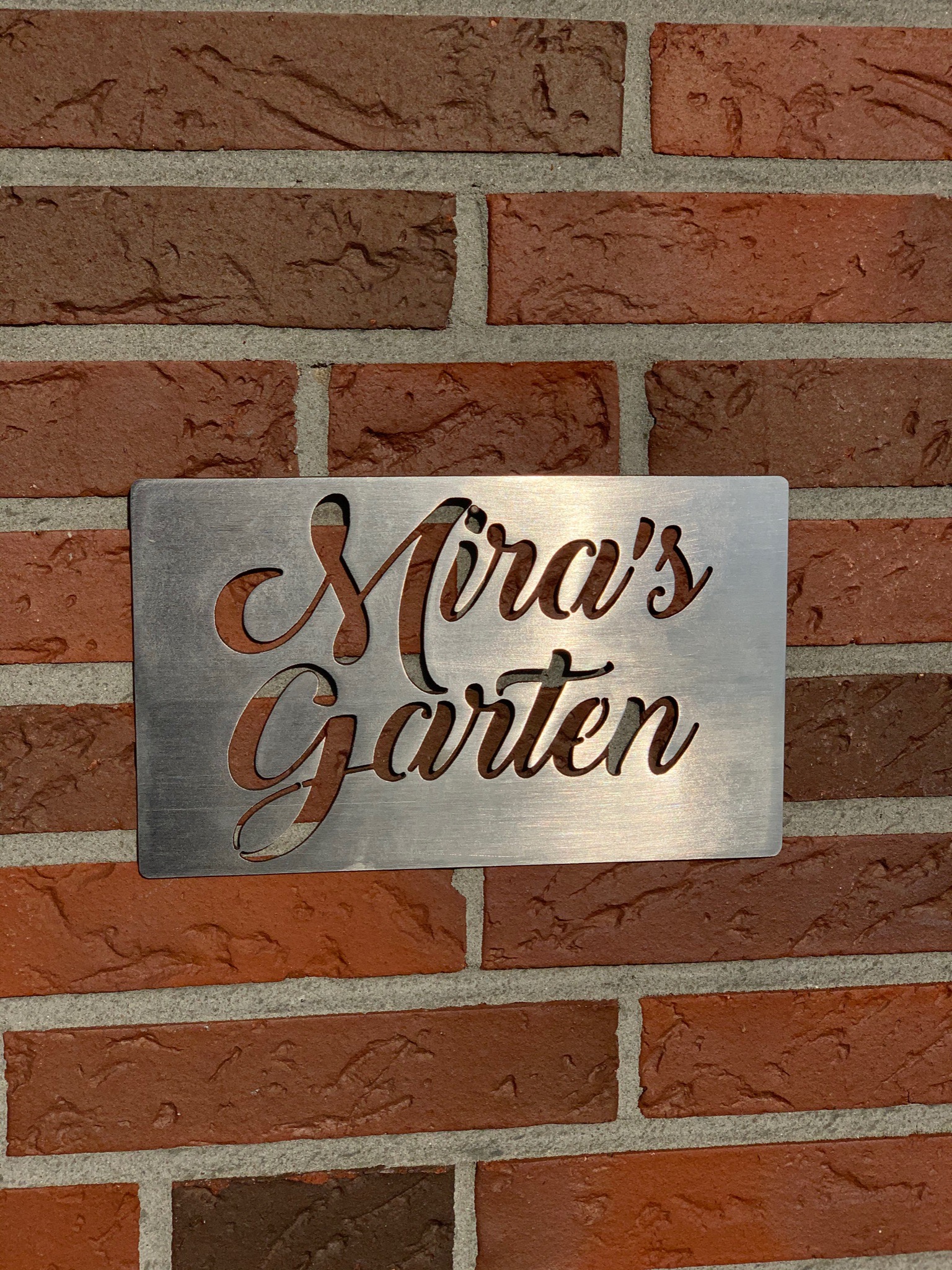 Schild Edelstahl Miras Garten
