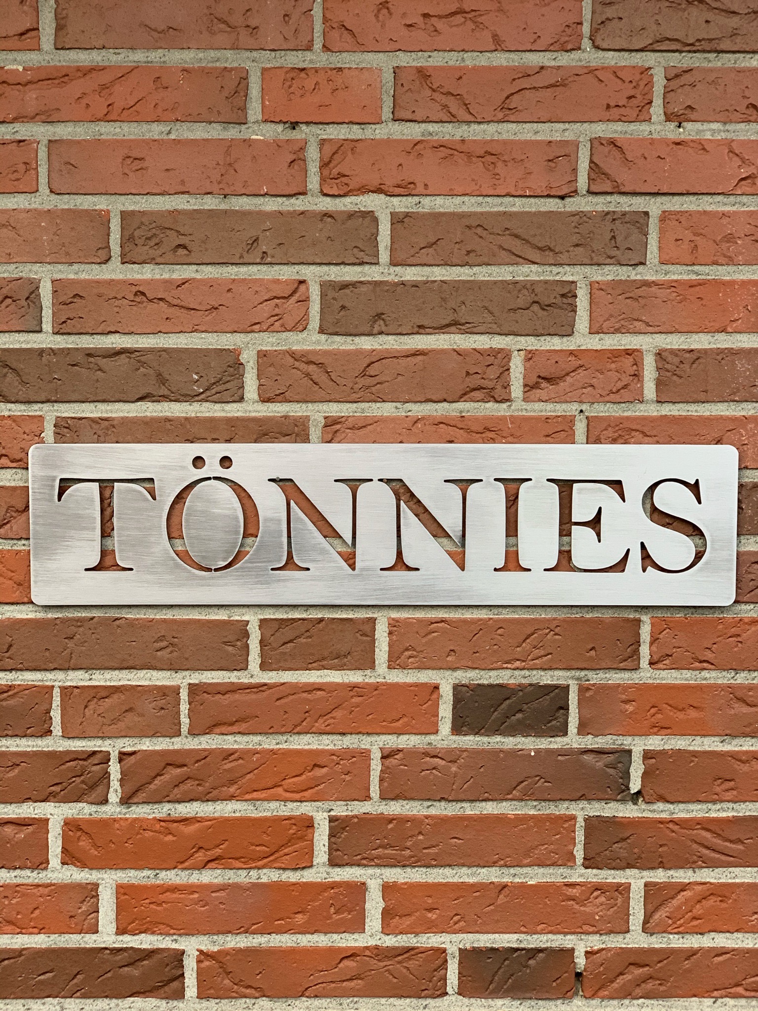Schild Toennies