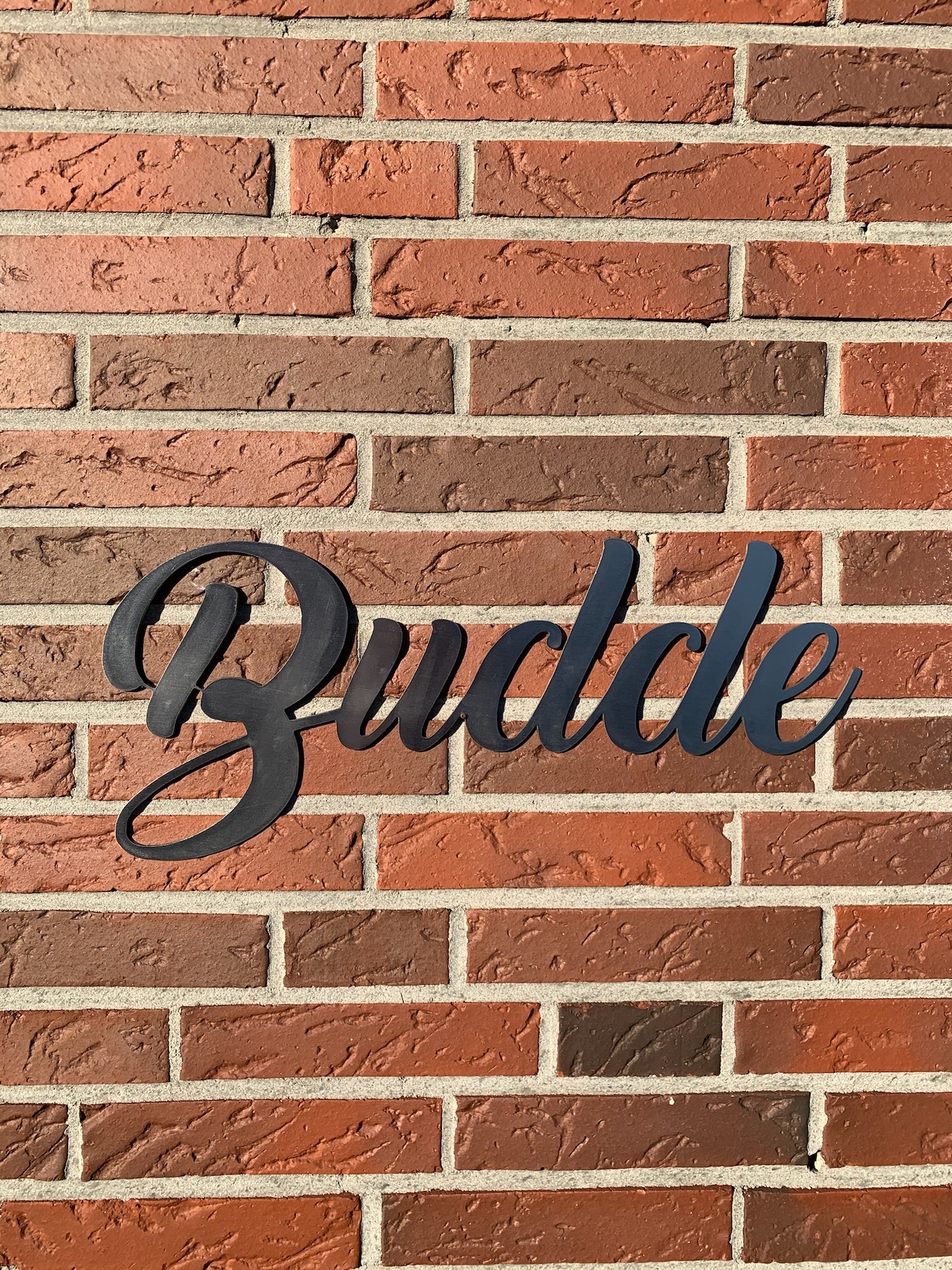 Schriftzug Edelstahl Budde