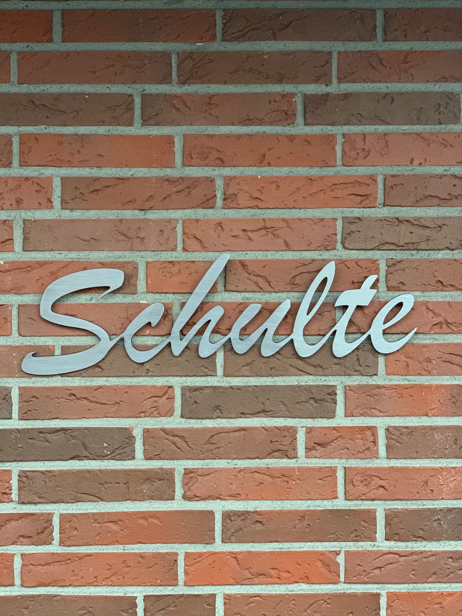 Schriftzug Edelstahl Schulte